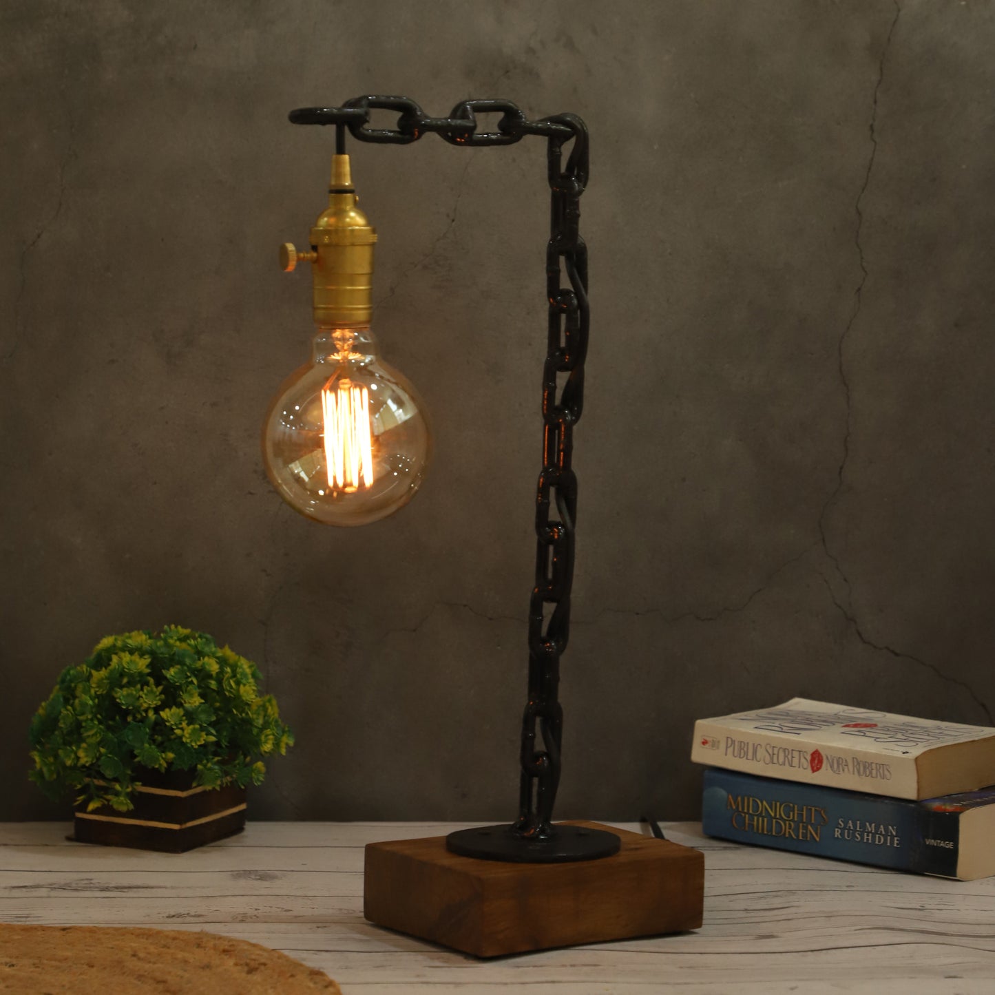Close-up of lamp features, including dimmable knob, brass bulb holder, rosewood base with smooth edges, and premium chain design