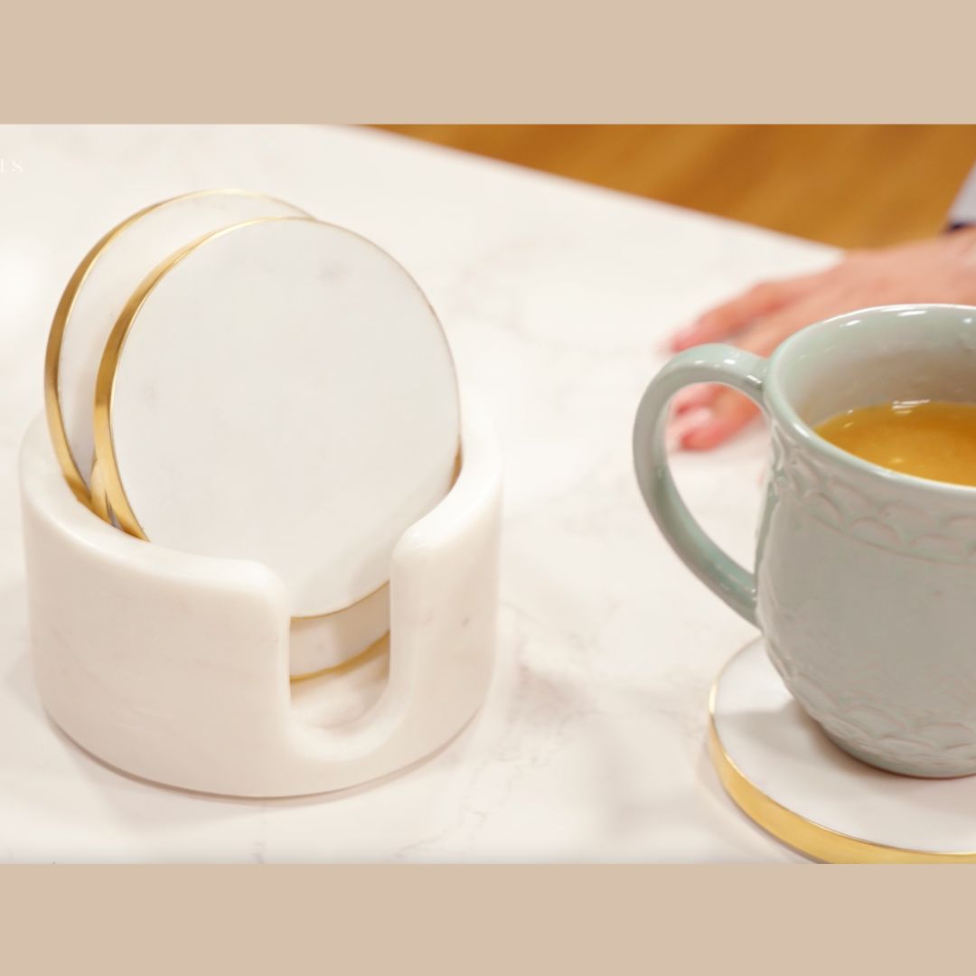 Gold rim marble coaster
