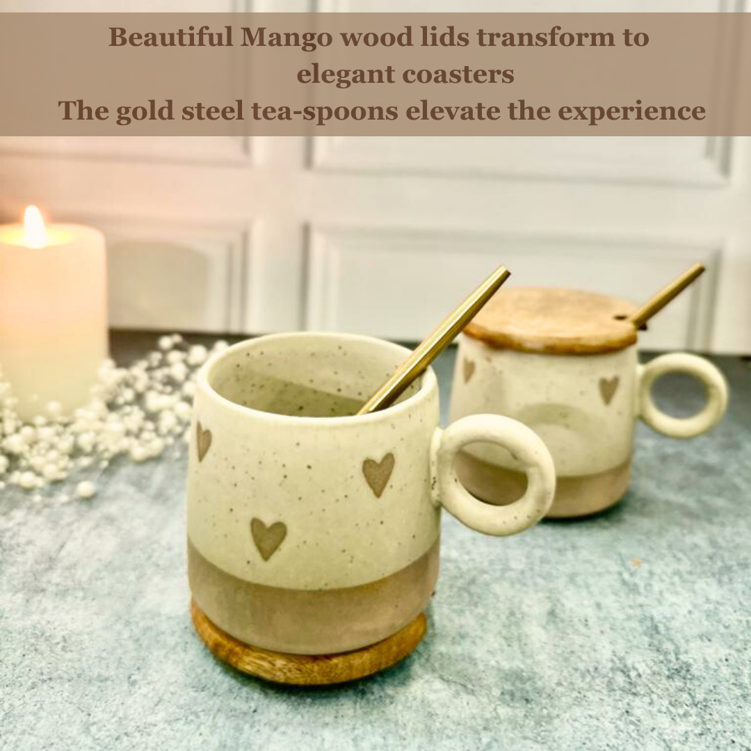 Two ceramic mugs with beige and white tones, adorned with small heart patterns, each topped with a wooden lid featuring a notch Beautiful Mugs