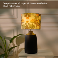 Lamp with a dark base and a jungle-themed shade, showing dimensions and features like handmade craftsmanship, E27 bulb holder, and anti-skid felt bottom — thumbnail