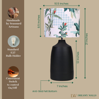 Lamp with a dark base and a jungle-themed shade, showing dimensions and features like handmade craftsmanship, E27 bulb holder, and anti-skid felt bottom — thumbnail
