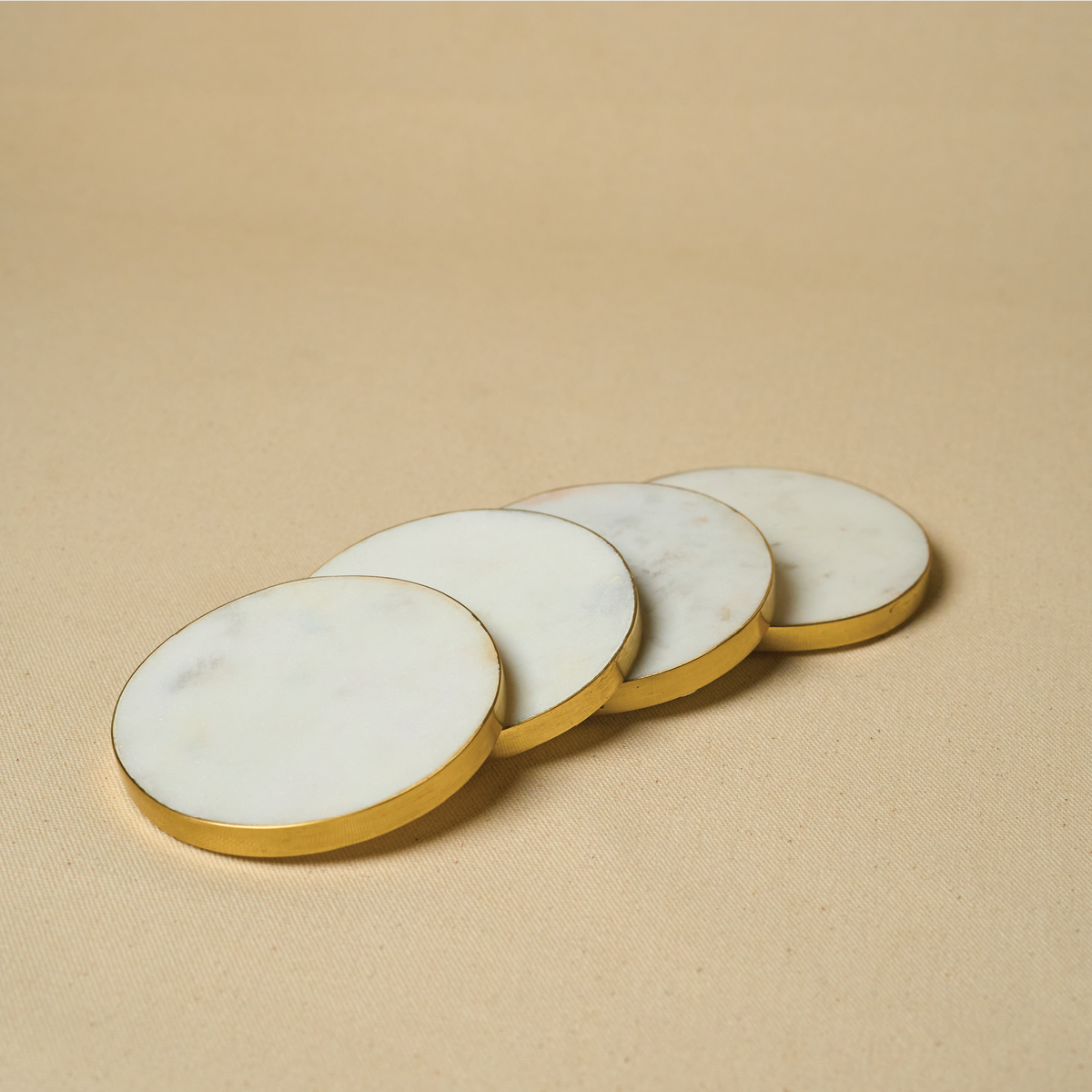 Gold rim marble coaster