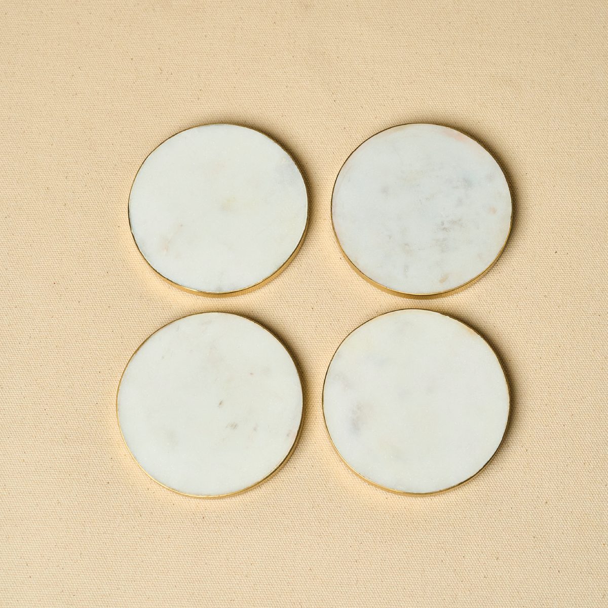 Gold rim marble coaster