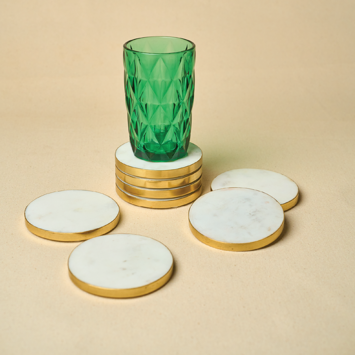 Gold rim marble coaster