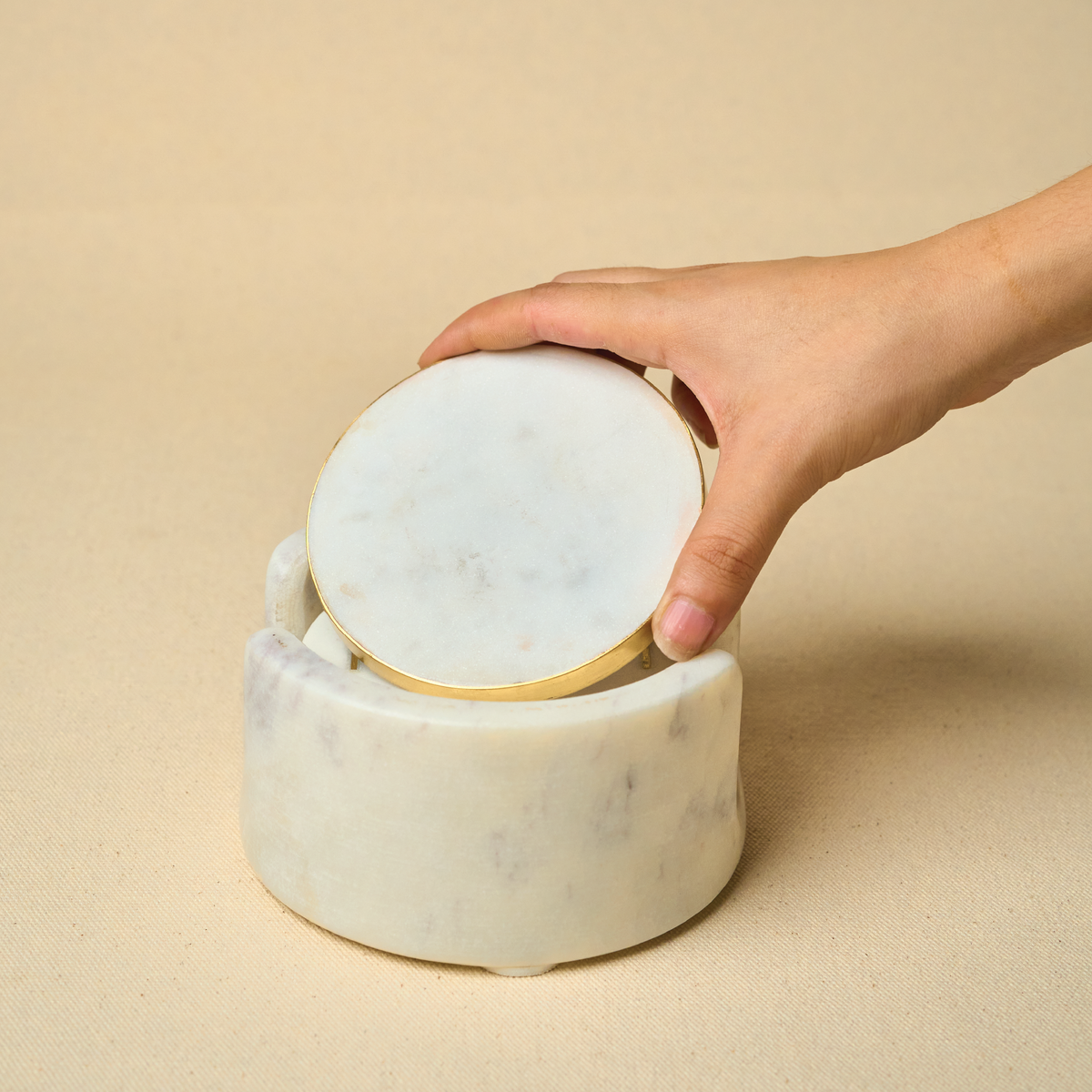 Gold rim marble coaster